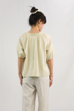 light yellow gathered blouse