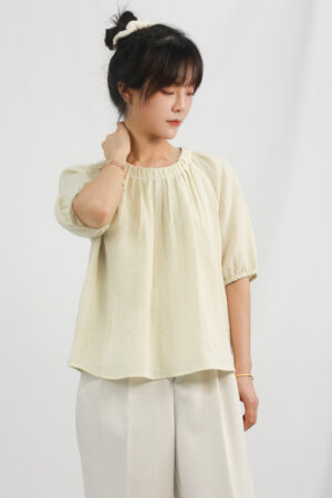 light yellow gathered blouse