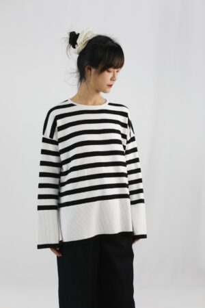 black and white striped long sleeved knitted sweater